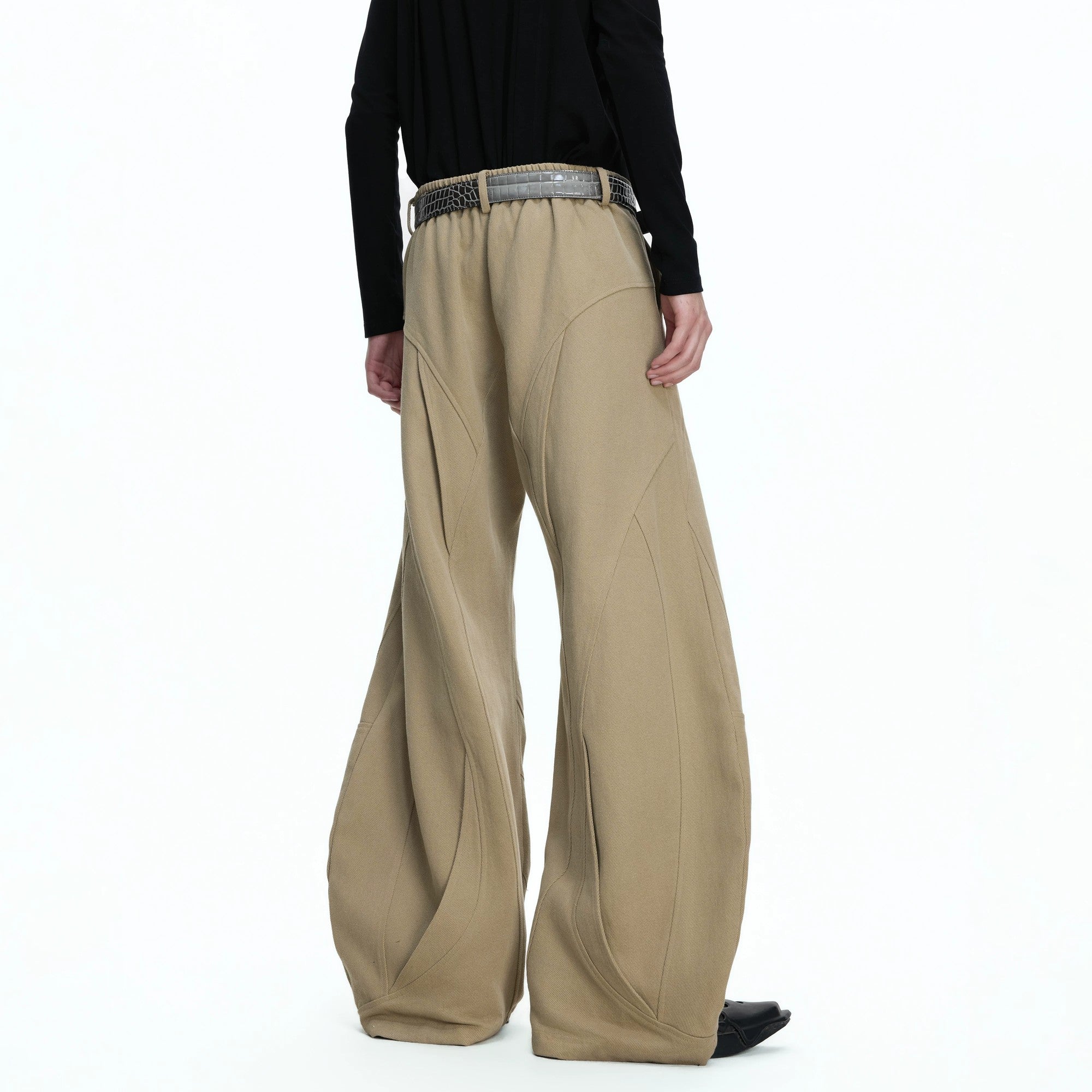 Close up of zipper and pocket details on washed canvas pants