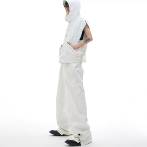 Detail of the split pants hem with metal hardware accents