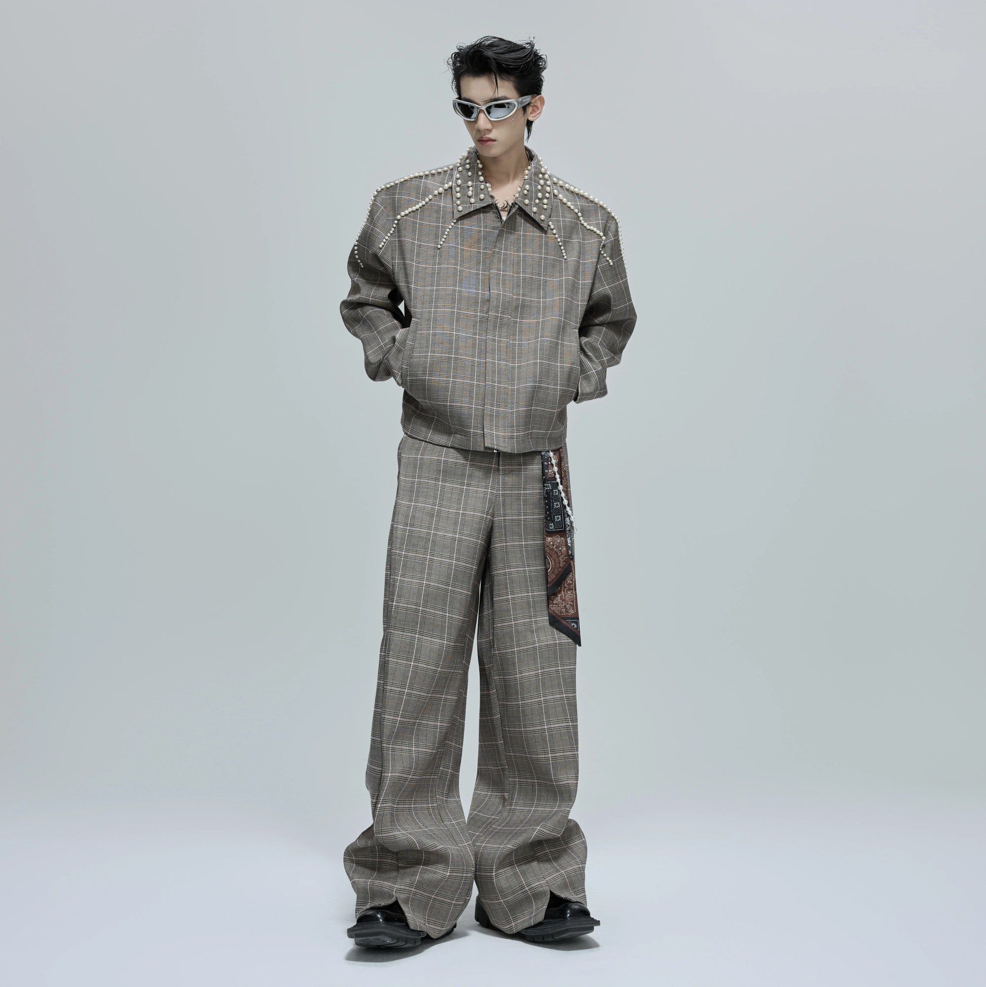 Full view of the brown houndstooth two-piece streetwear set