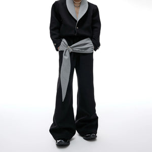 Back profile of the loose fit houndstooth streetwear outfit