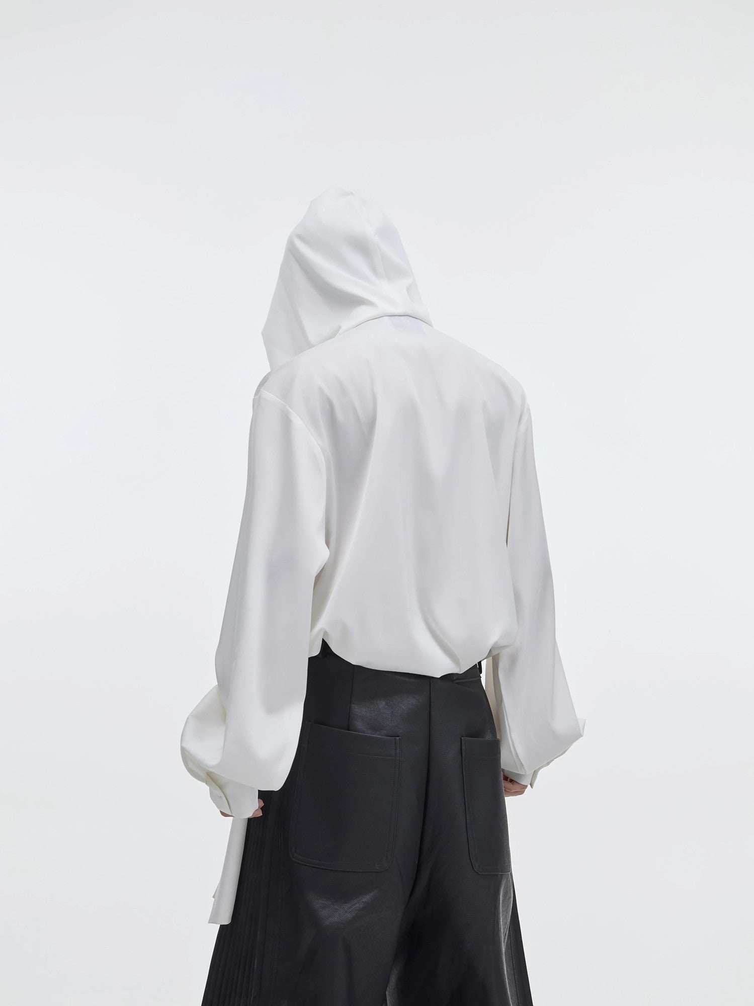 Back view of the minimalist solid color hooded cardigan