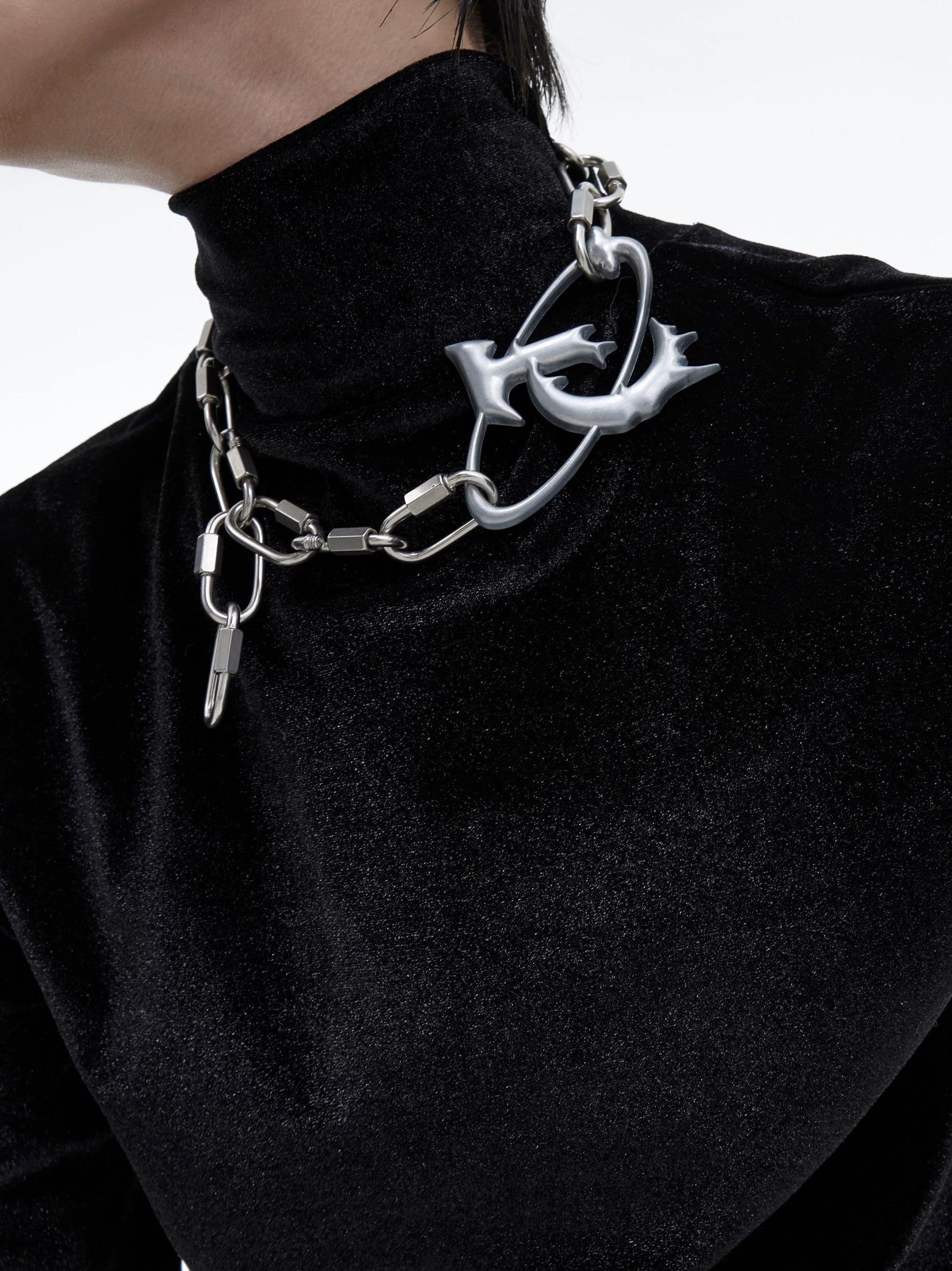 Matte silver industrial lock pendant necklace for punk streetwear style.