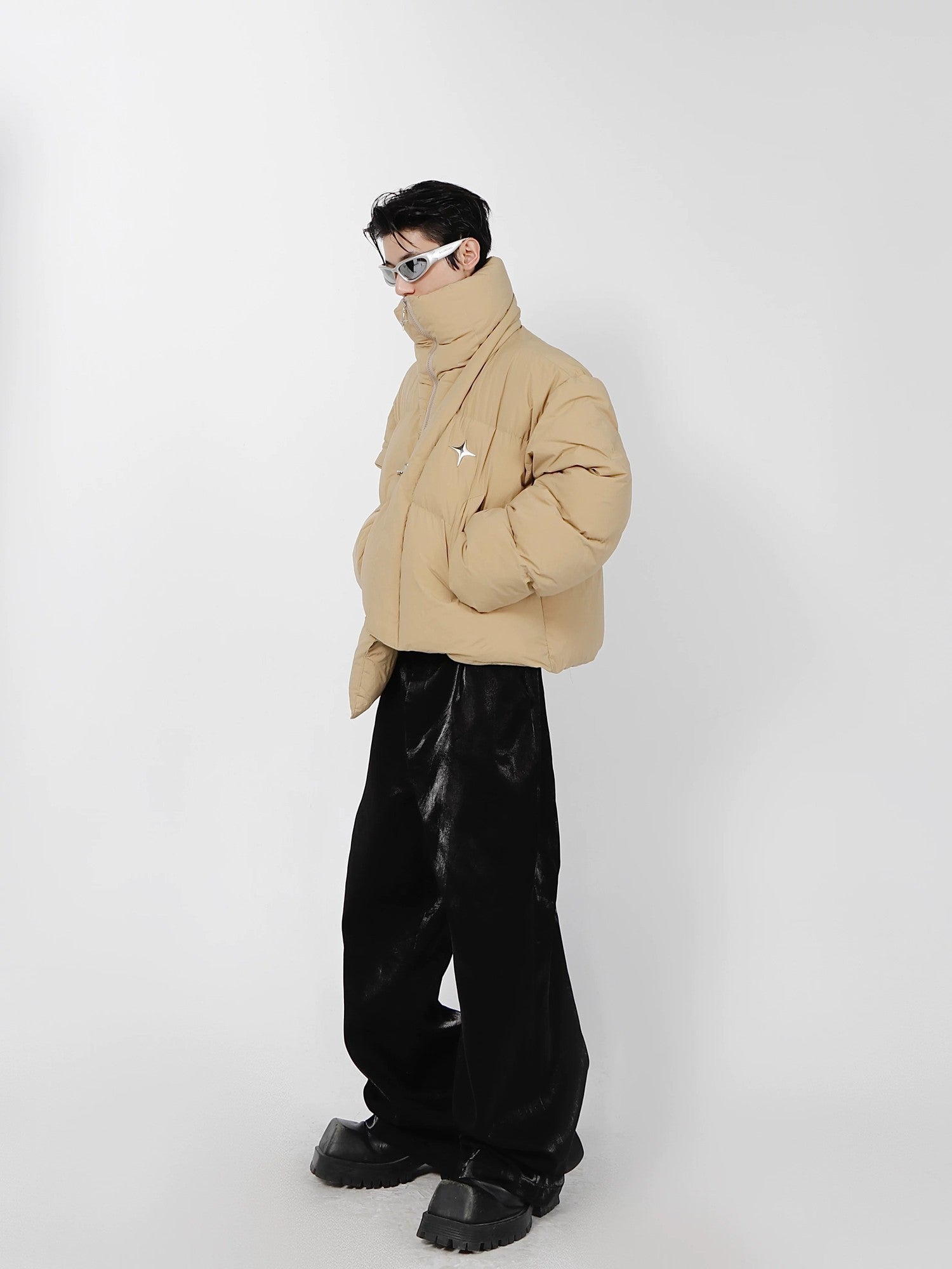 Close up of metal accents on a futurist street style puffer