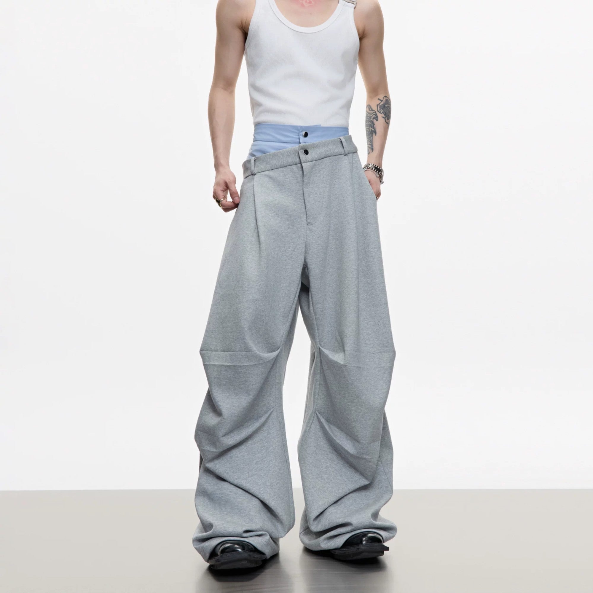 Close up of the contrast shirt stitching and silver zipper hardware