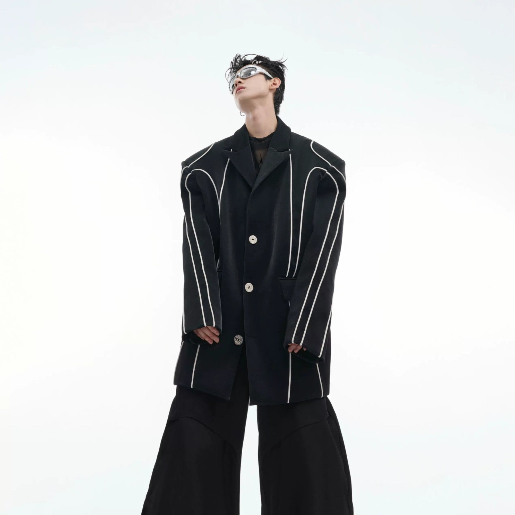 Front view of black liquid metal PU leather blazer with reflective piping