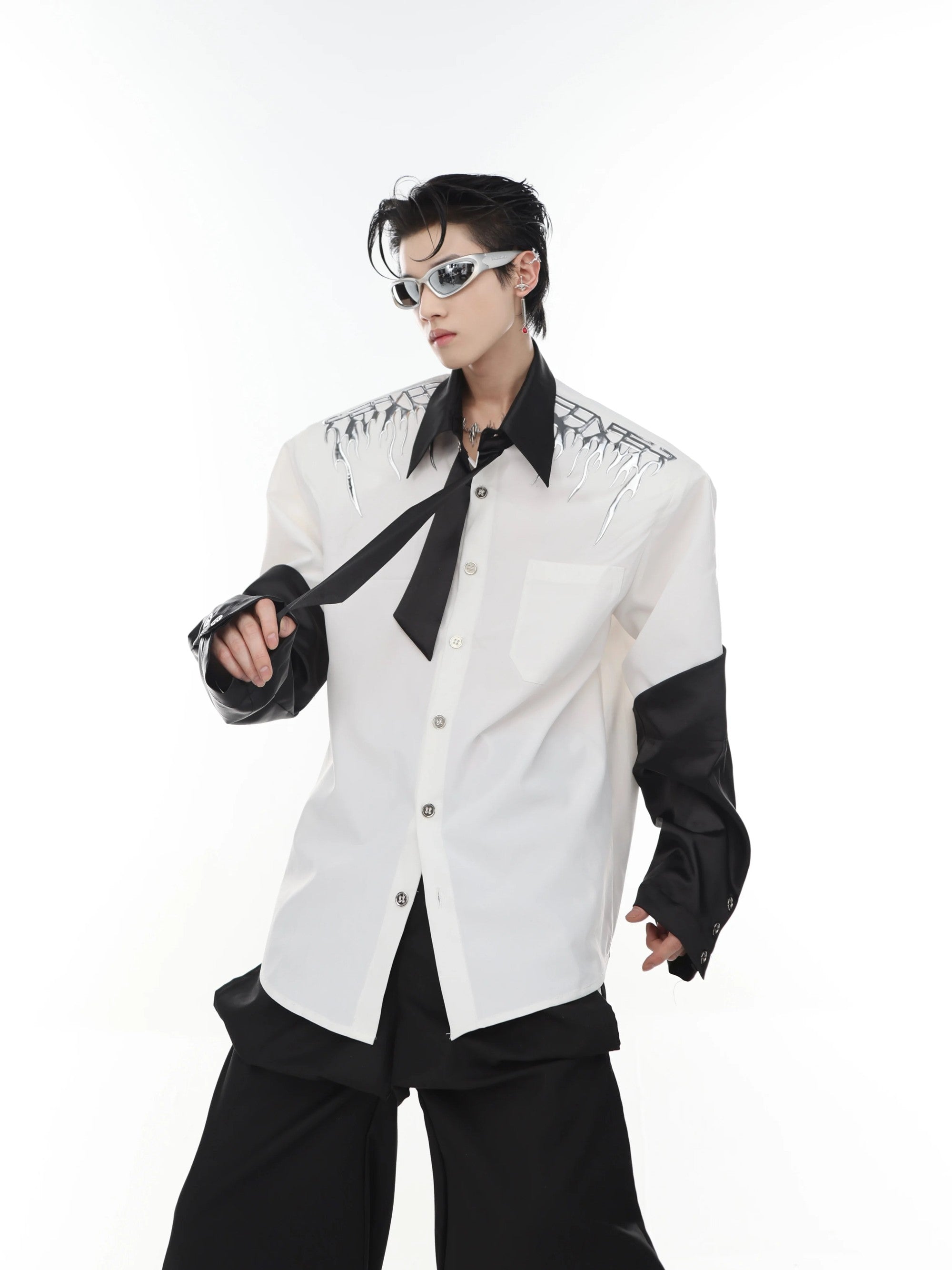 Model wearing the loose silhouette liquid metal streetwear shirt