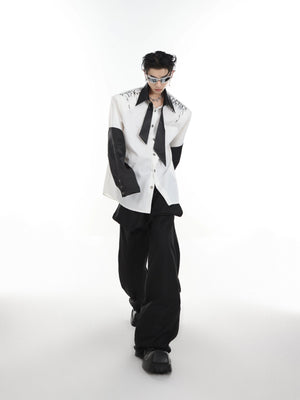 Back view of the oversized black and white contrast shirt jacket