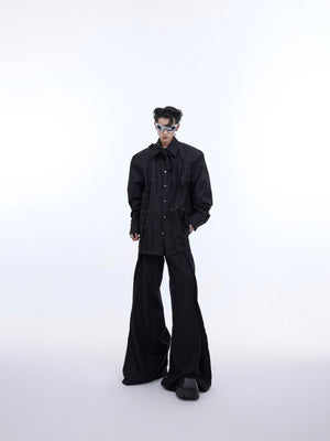 Back view of avant-garde white shirt featuring bold pleated details and modern streetwear silhouette