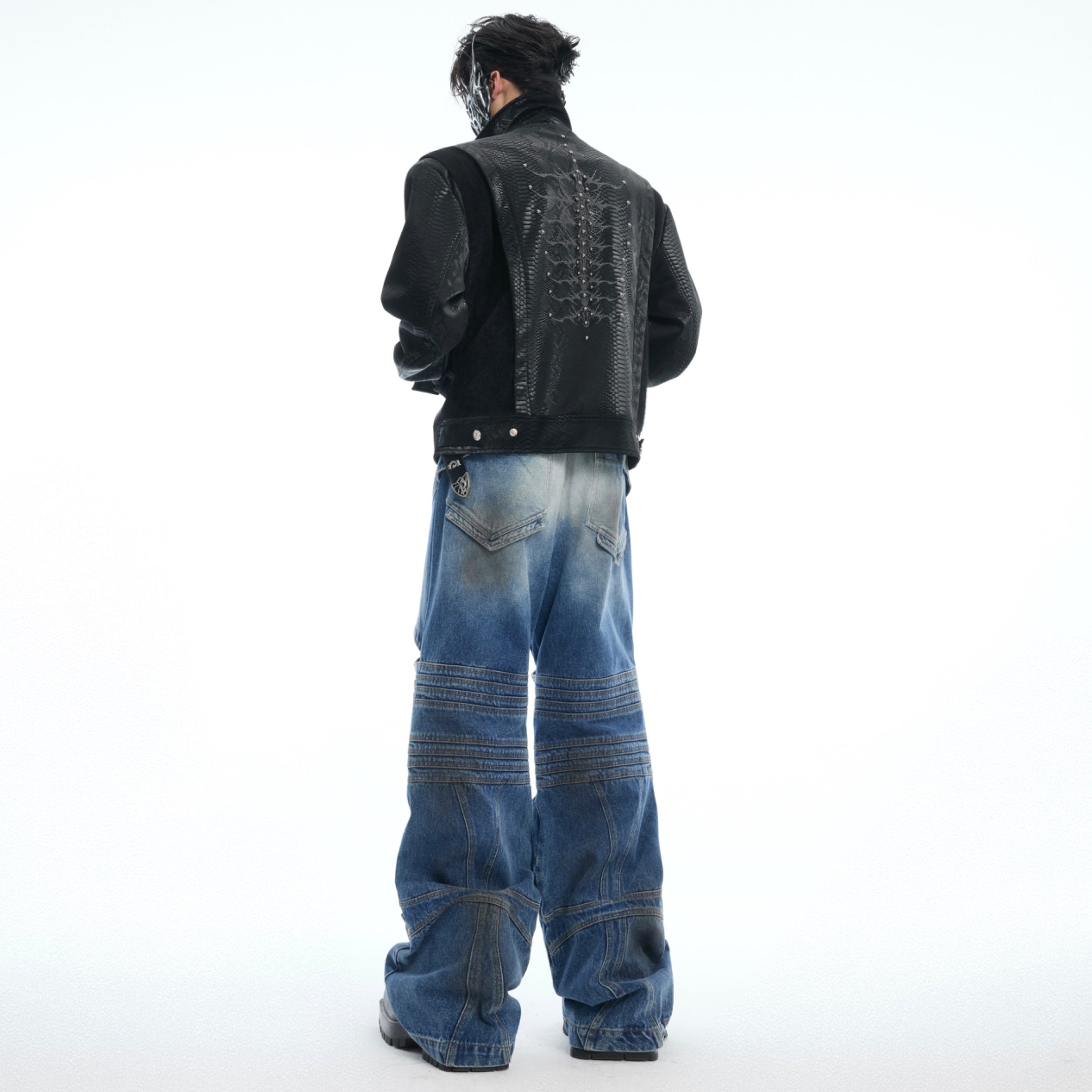 Full-length outfit styling with deconstructed cross-cut jeans for bold streetwear looks