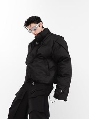 Close-up detail of avant-garde jacket showing high-quality metal zipper and structured collar