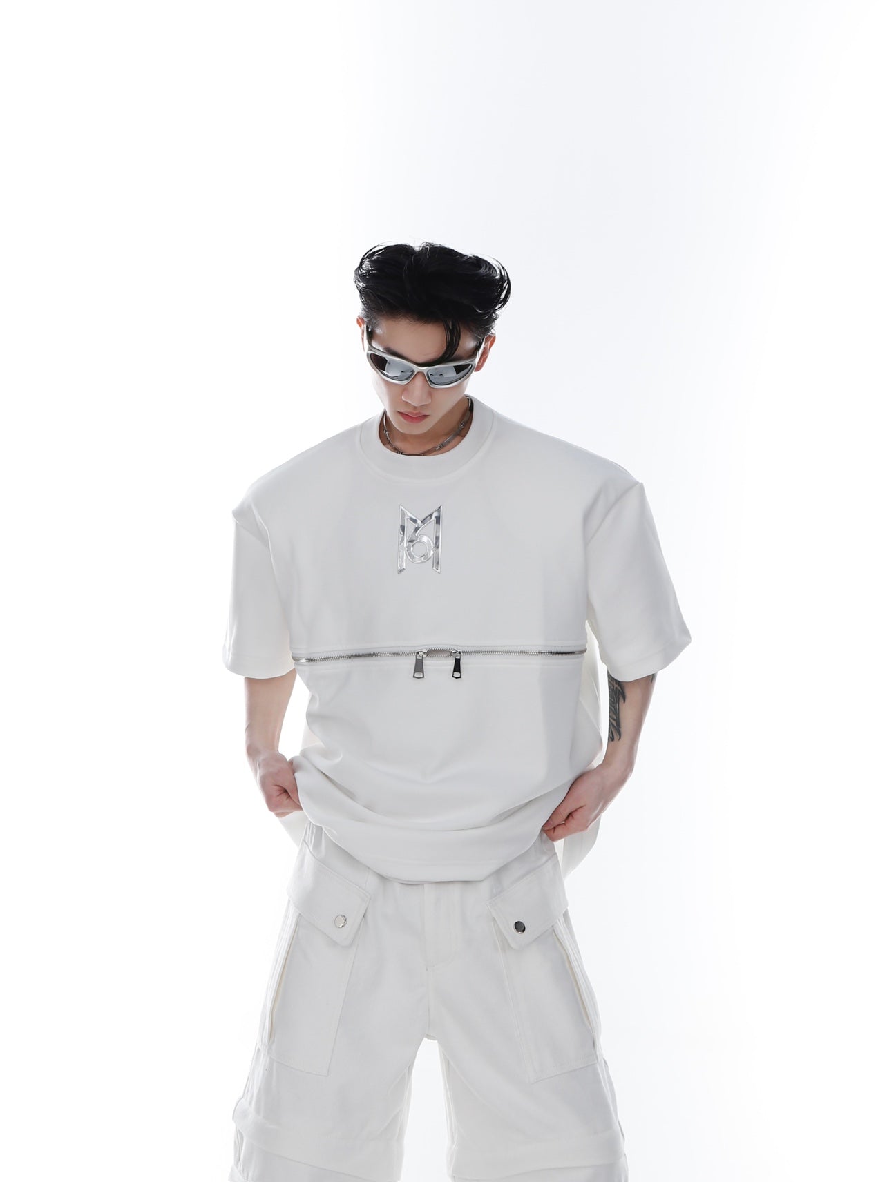 Back view of boundary-pushing unisex jacket showcasing its architectural silhouette design