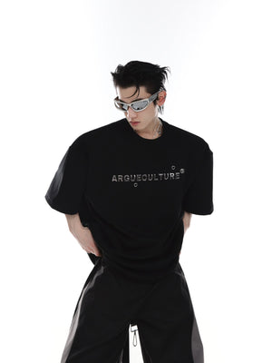 Back view of the architectural silhouette tee featuring bold graphic print and loose-leaf details