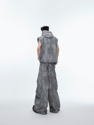 Front view showing detachable elements and asymmetric design of this deconstructed streetwear vest