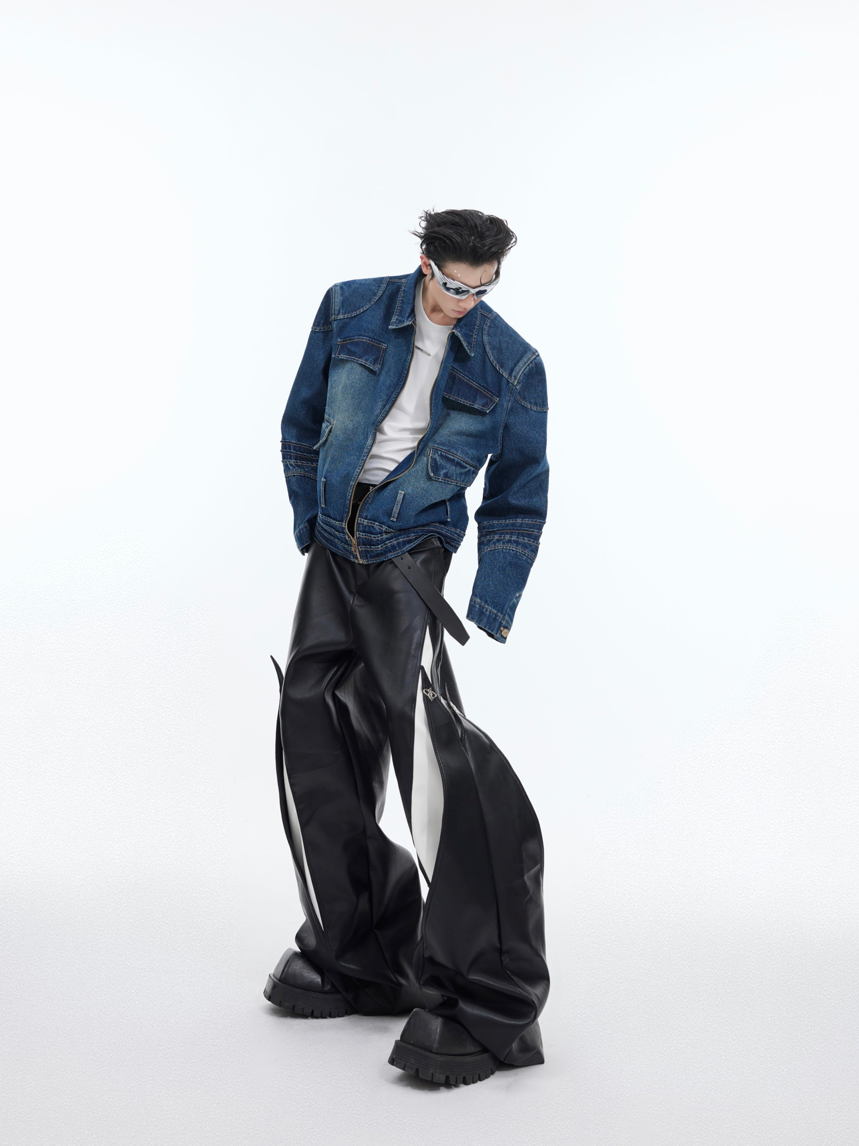 Back view displaying the asymmetrical design and metal button accents on these statement pants