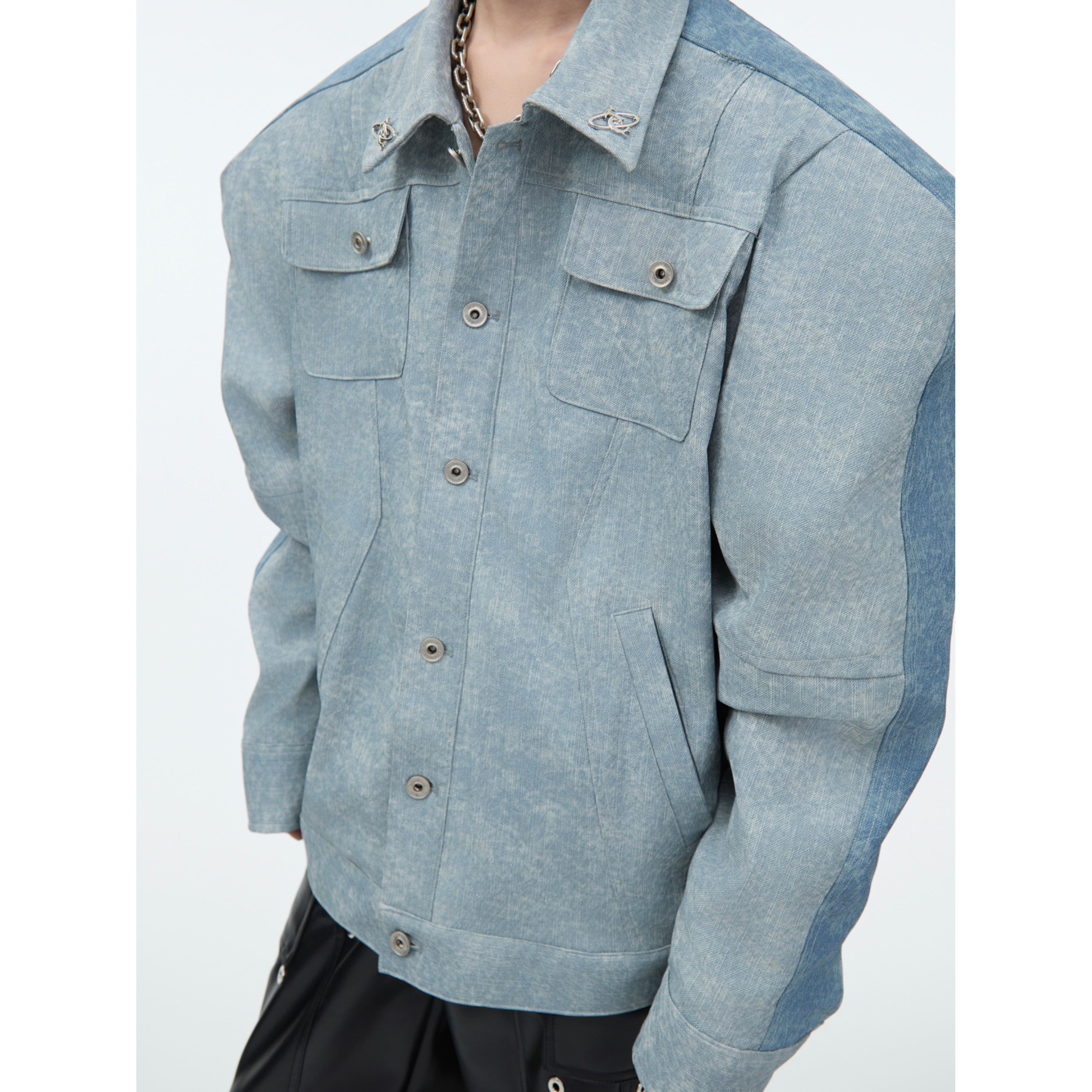 Front view of textured PU leather asymmetrical bomber jacket with edgy contemporary fashion design