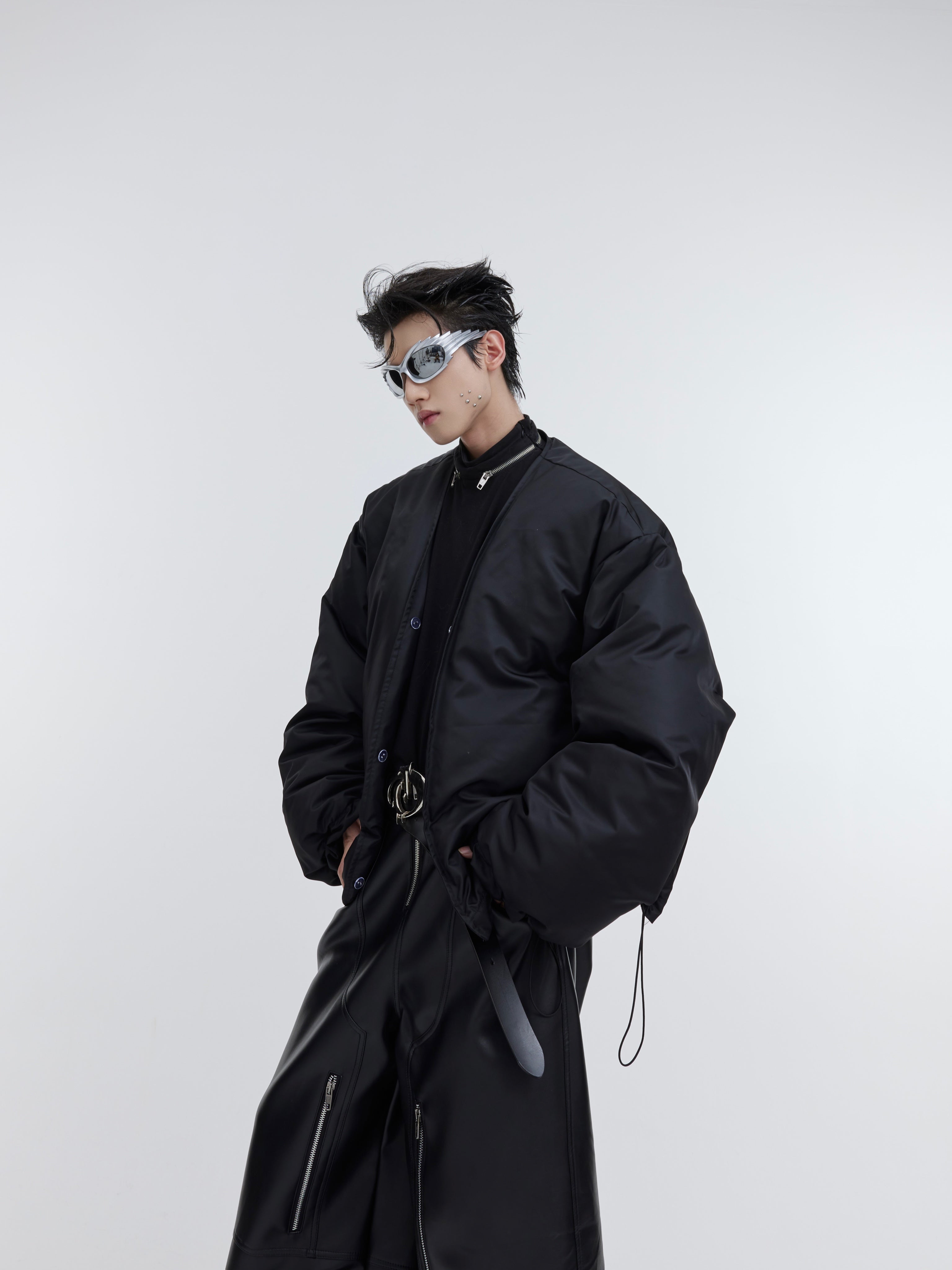 Side view of heavy-duty cotton puffer jacket with oversized streetwear design and plush collar