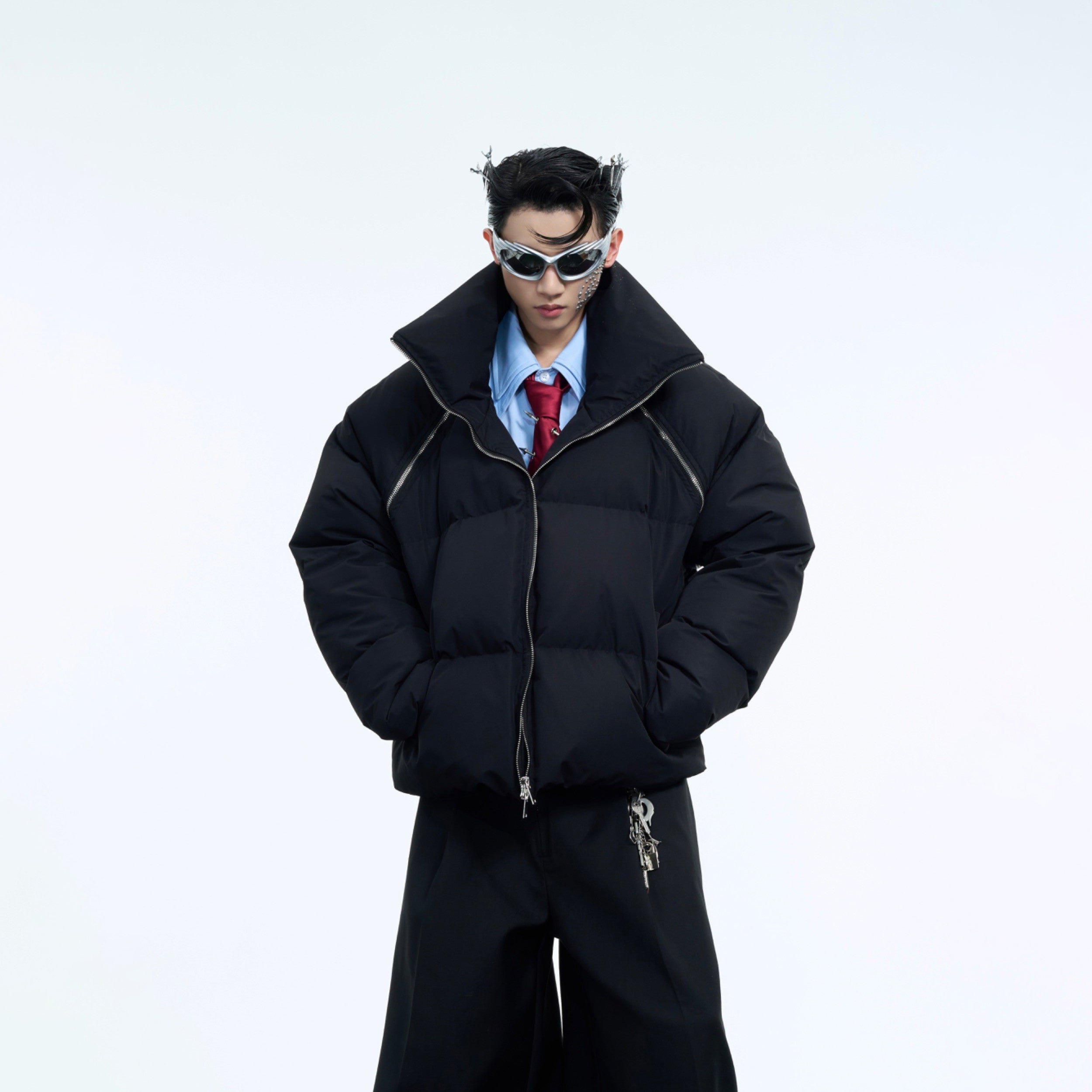 Short puffer jacket worn in different configurations demonstrating its multi-way wear functionality