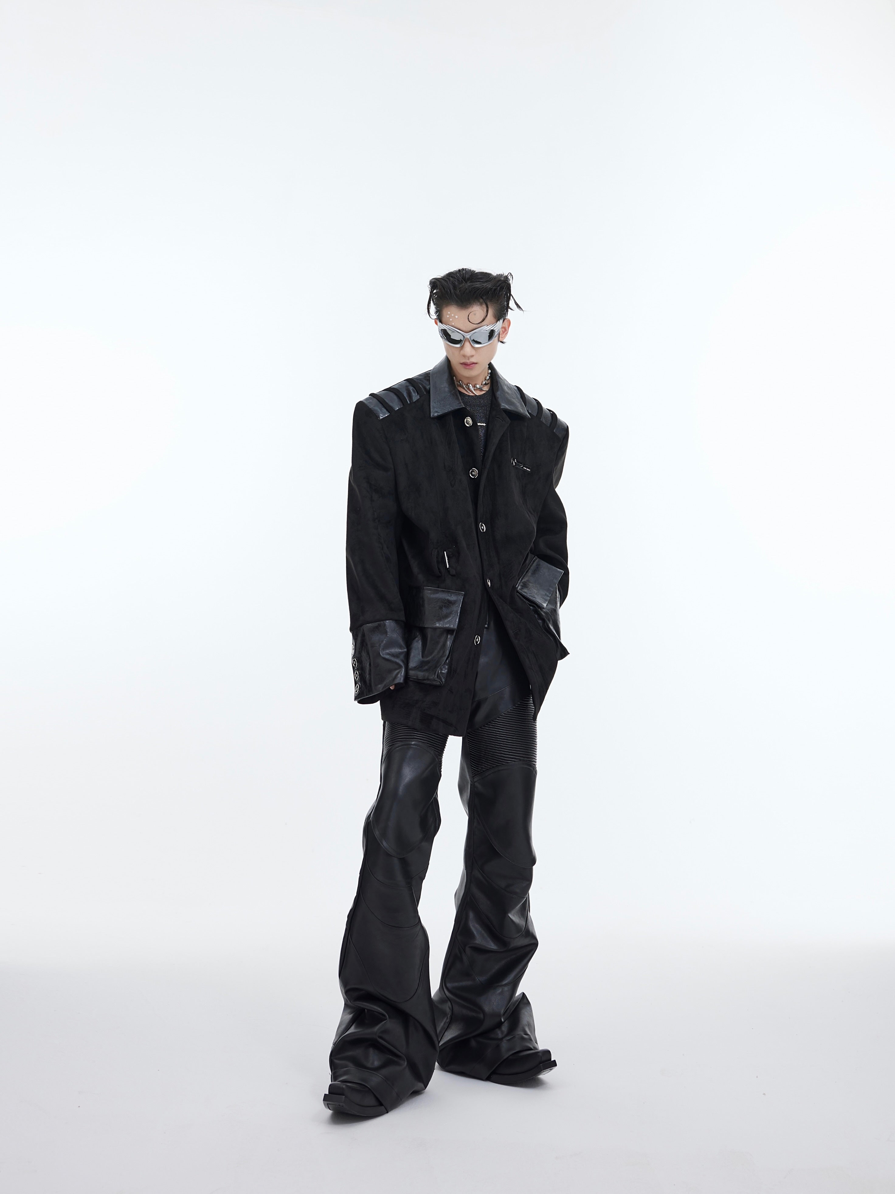 Close-up of reinforced composite fabric and structured shoulder pads on deconstructed blazer