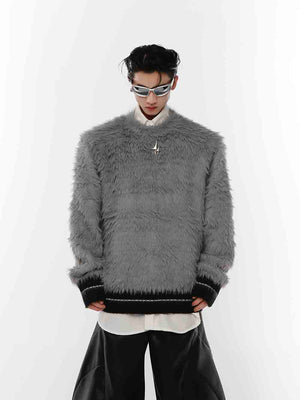 Oversized chunky knit sweater with avant-garde metal trim details, a unisex streetwear essential