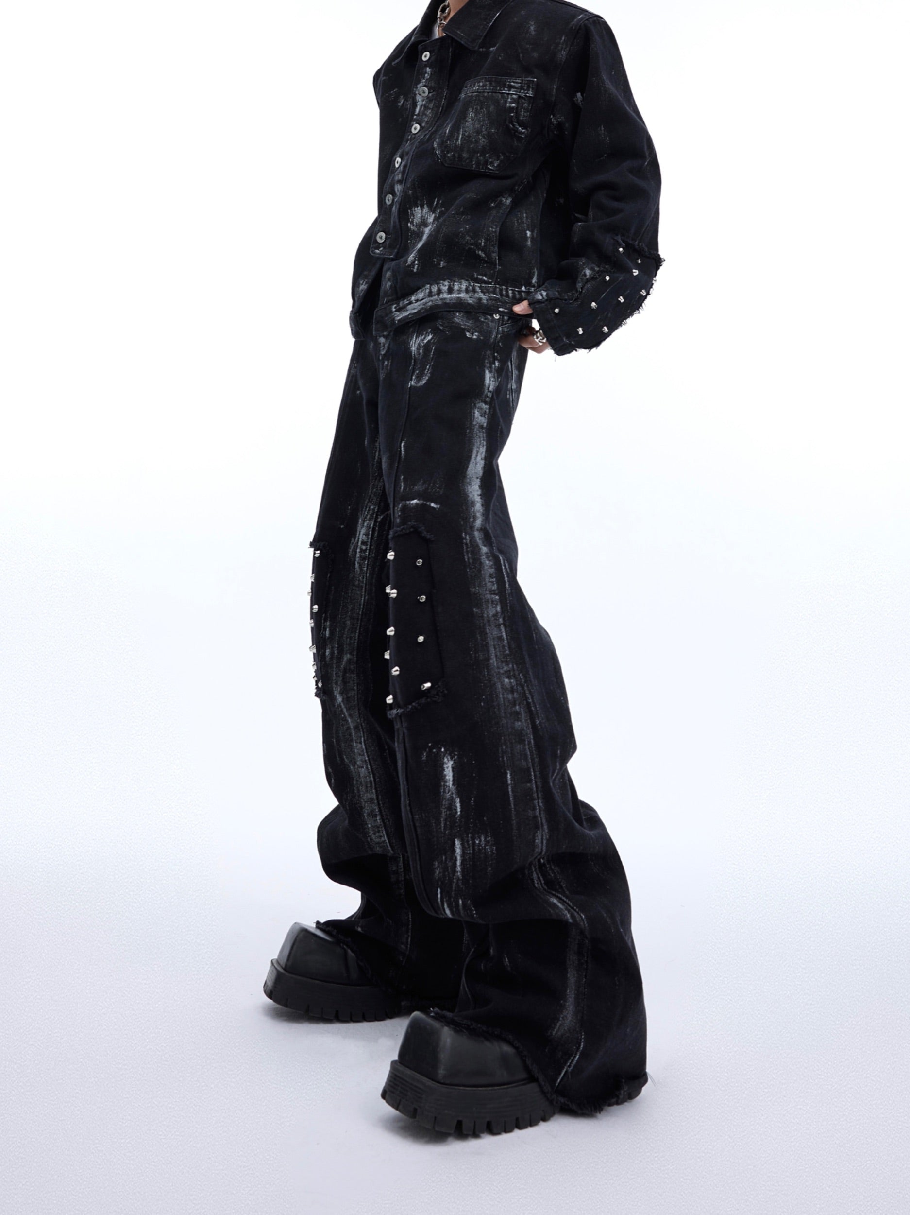 Close-up of handcrafted airbrush artwork on vintage-inspired denim jacket and jeans set