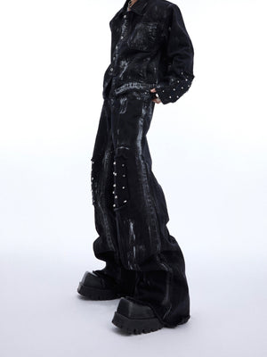 Close-up of handcrafted airbrush artwork on vintage-inspired denim jacket and jeans set