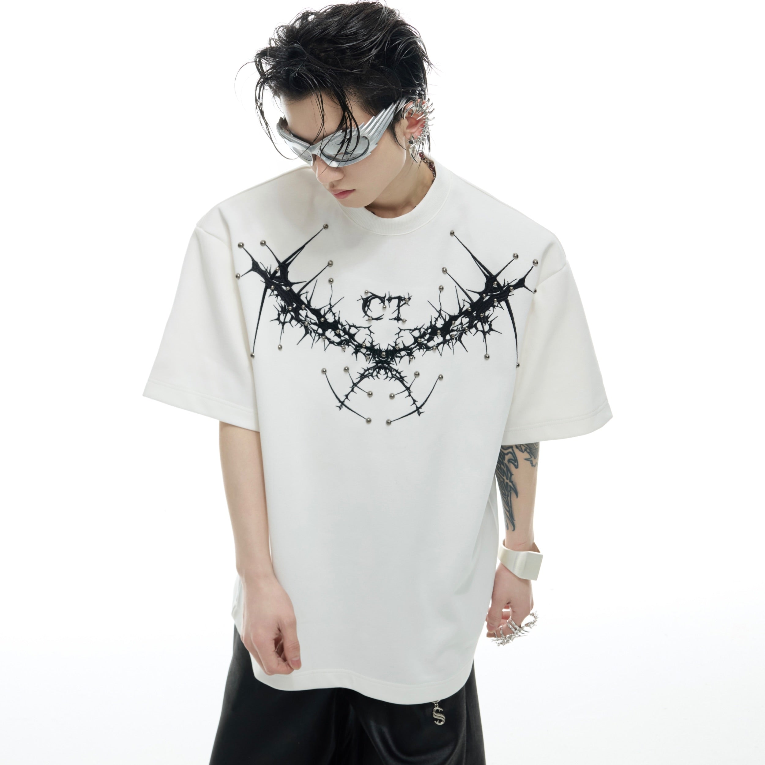 Close-up of premium handcrafted embroidery on edgy streetwear t-shirt showing fine craftsmanship