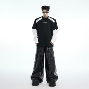 Side angle showcasing the unique sleeve attachment system of this innovative streetwear top