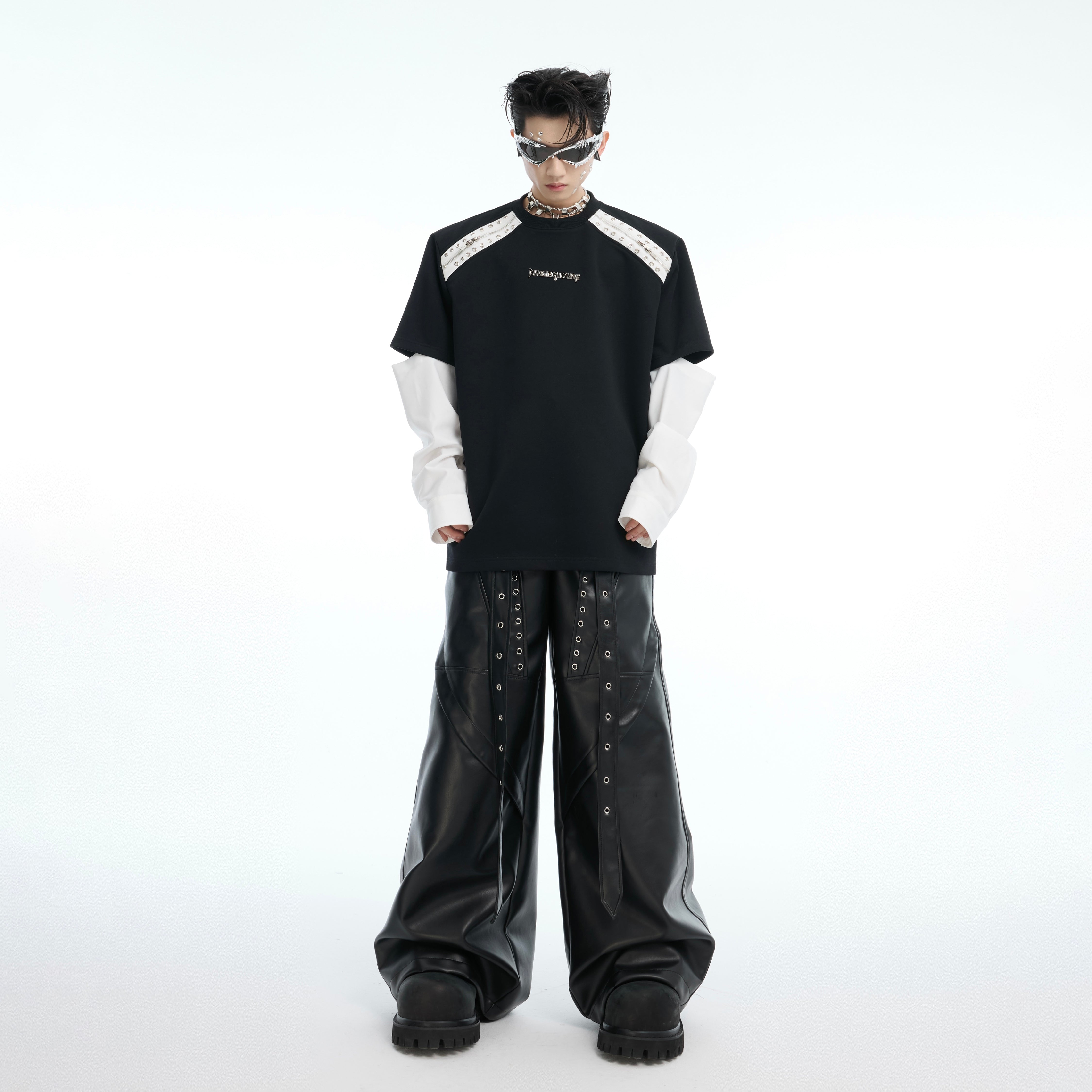 Side angle showcasing the unique sleeve attachment system of this innovative streetwear top