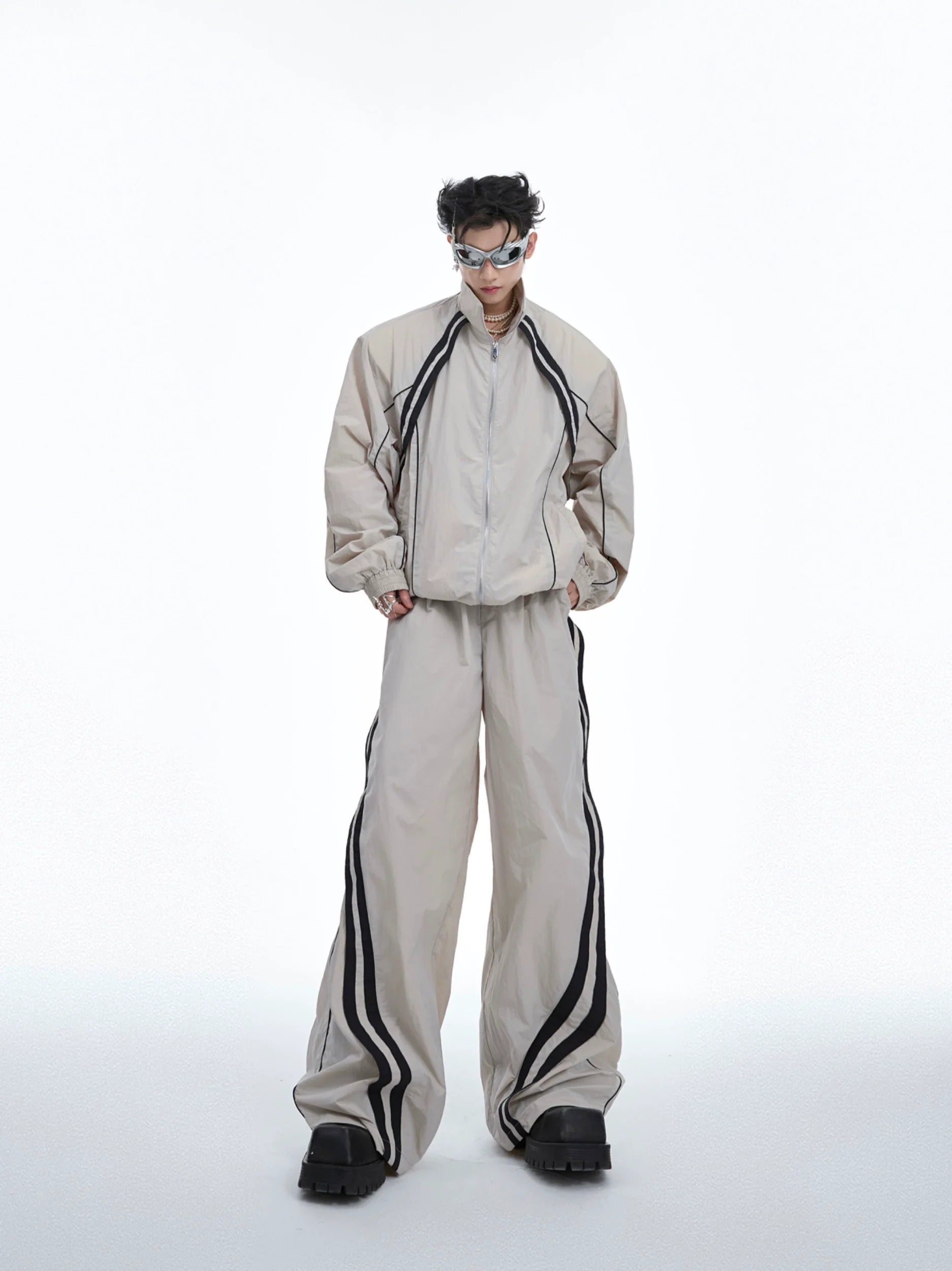 Color-block sun hoodie with deconstructed streetwear design, showing oversized fit and avant-garde aesthetic details