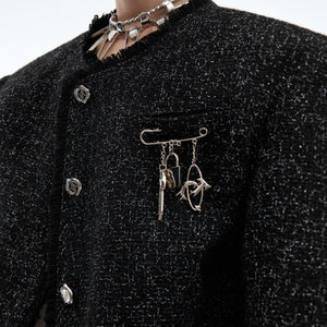 Side profile of stylish cropped coat featuring asymmetric design and structured fit