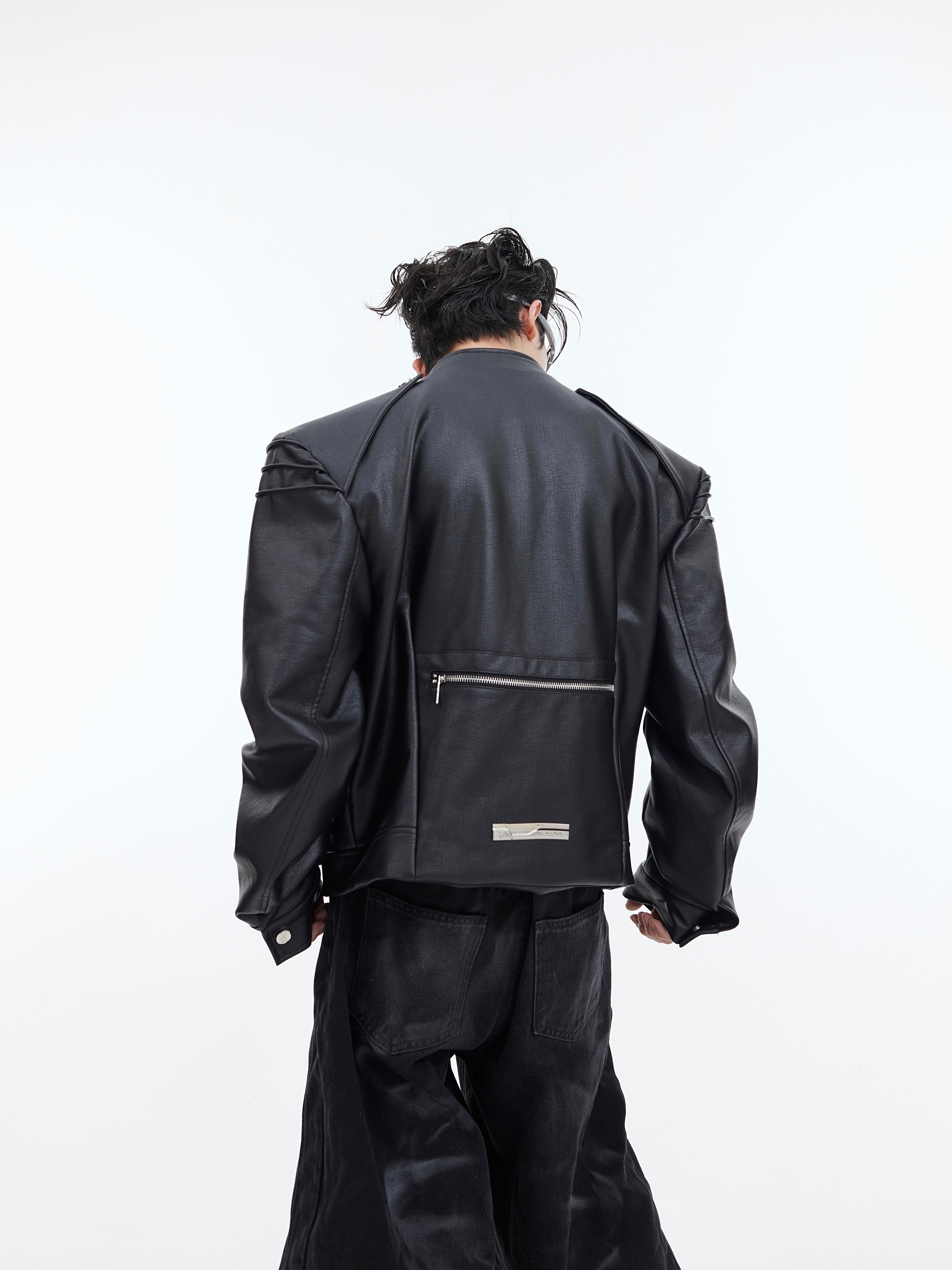 Close-up detail of heavyweight deconstructed biker jacket showing quality stitching and unique panel construction