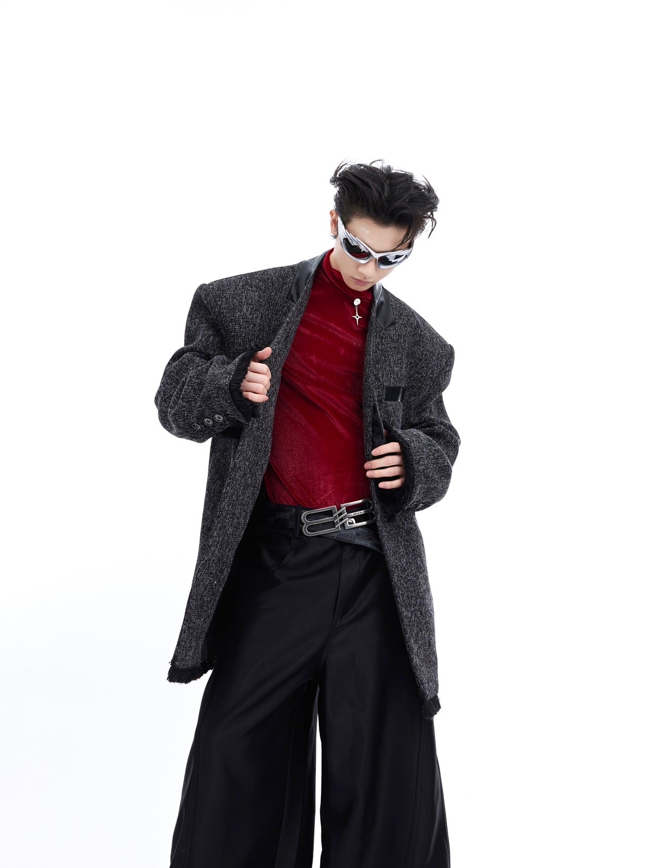 Deconstructed double layer blazer with pleated detailing, showcasing avant-garde streetwear style for spring