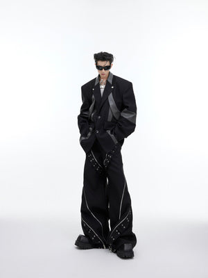 Close-up of statement shoulder pad design on fashion-forward deconstructed blazer