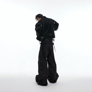 Detailed shot of the innovative deconstructed military collar on this high-fashion leather jacket