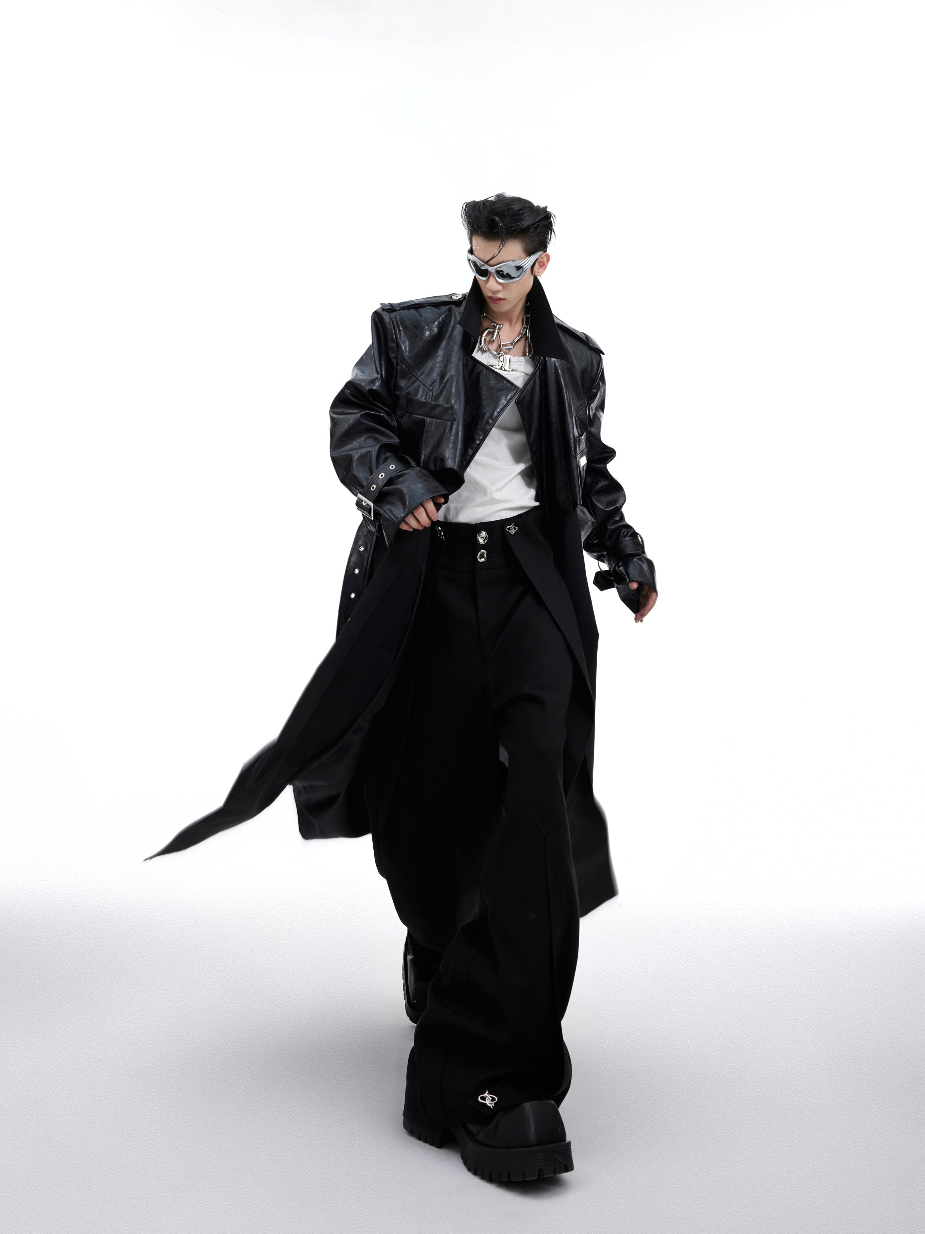 Deconstructed oversized long coat with unique double-layer patchwork design, perfect for avant-garde streetwear looks