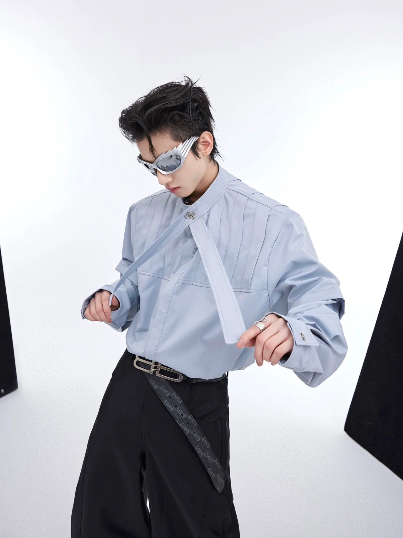 Deconstructed pleated oversized shirt in streetwear style with unique patchwork detailing and long sleeves