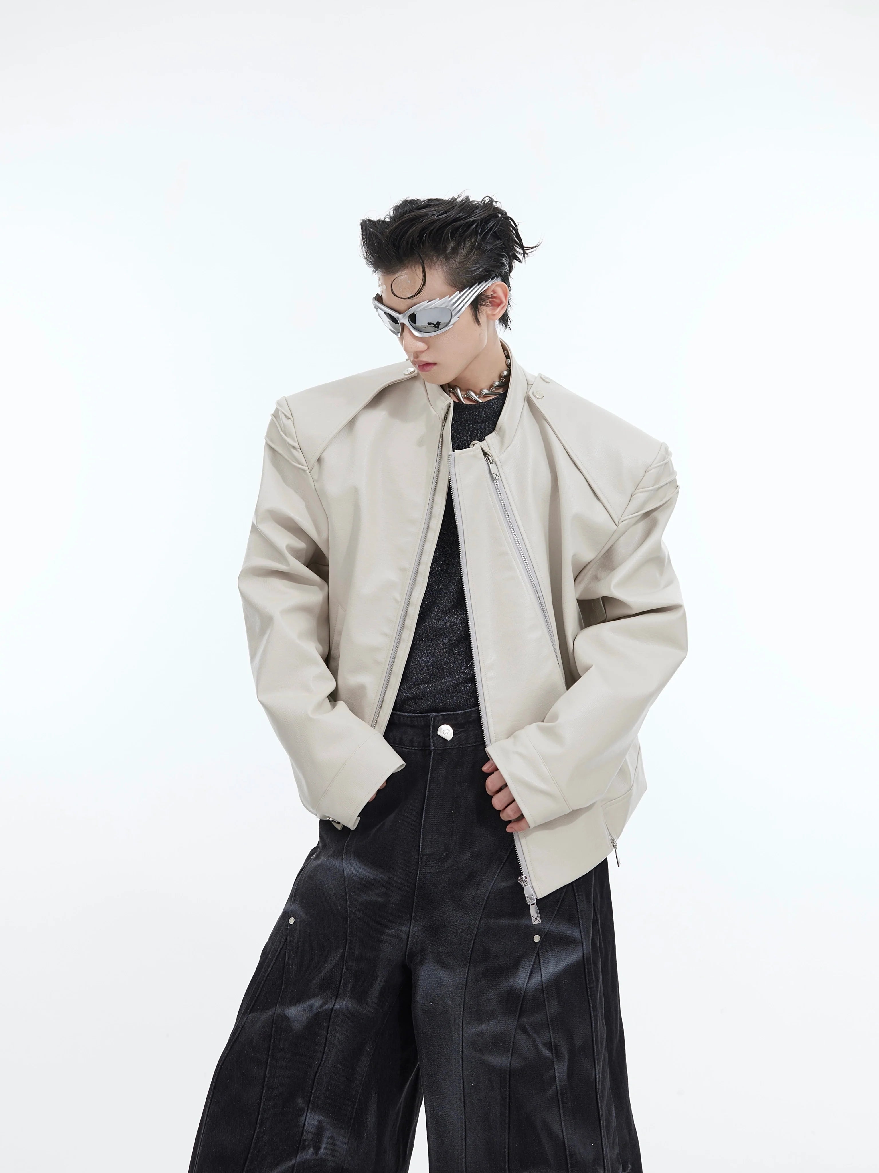Front view of deconstructed PU biker jacket with double zip closure, showcasing asymmetrical design and streetwear aesthetic
