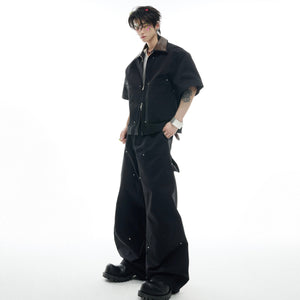 Deconstructed PU leather sleeve tee paired with studded cargo pants set, featuring asymmetric streetwear design