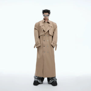 Front view of oversized metallic trench coat with deconstructed shoulder pads, showcasing avant-garde street style