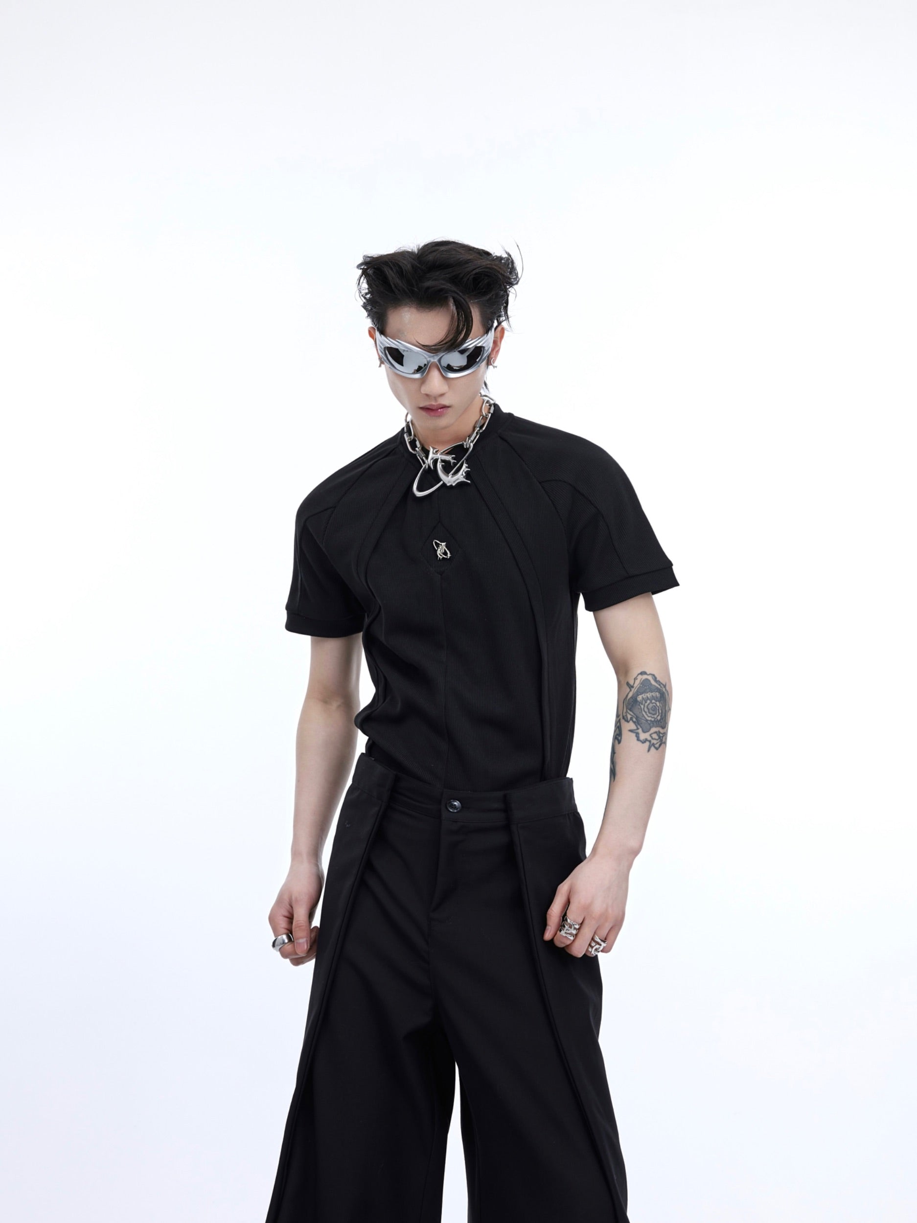 Front view of deconstructed unisex slim-fit tee showcasing unique textured streetwear design and avant-garde styling