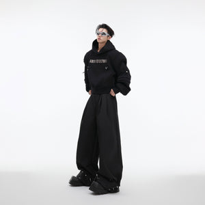 Side angle of the cropped oversized sweatshirt highlighting its distinctive deconstructed design elements