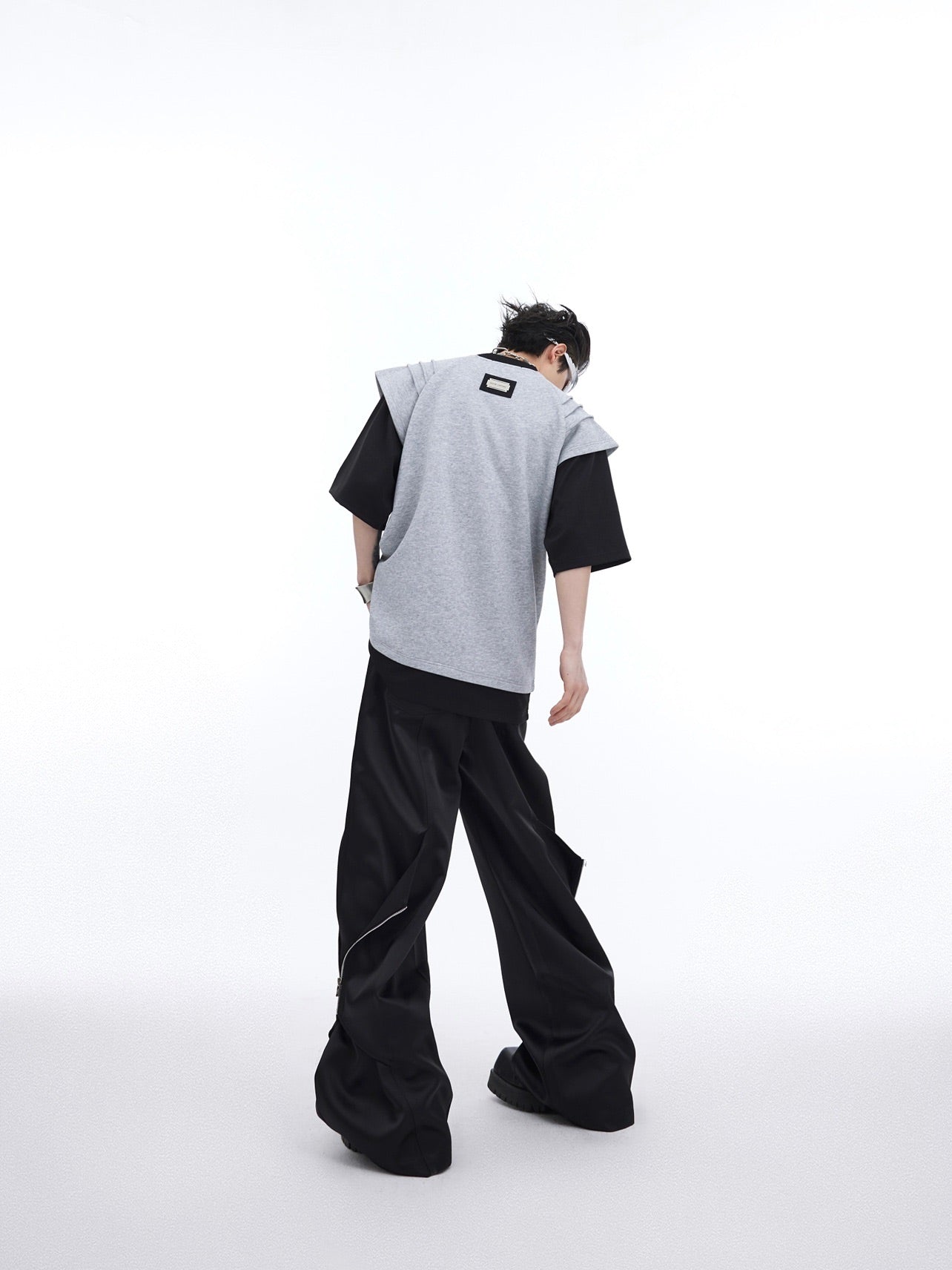 Front and back view of the deconstructed graphic tee showing its unique streetwear reinvention design