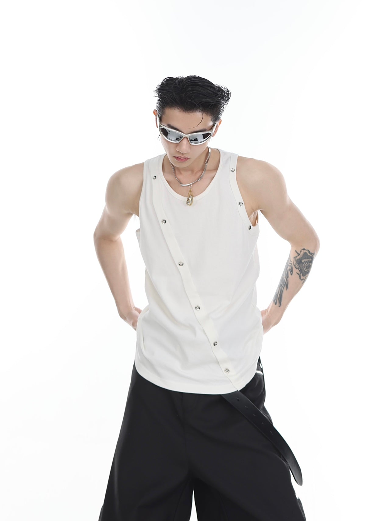 Close-up of deconstructed vest showing architectural 3D cutting detail and premium cotton blend fabric