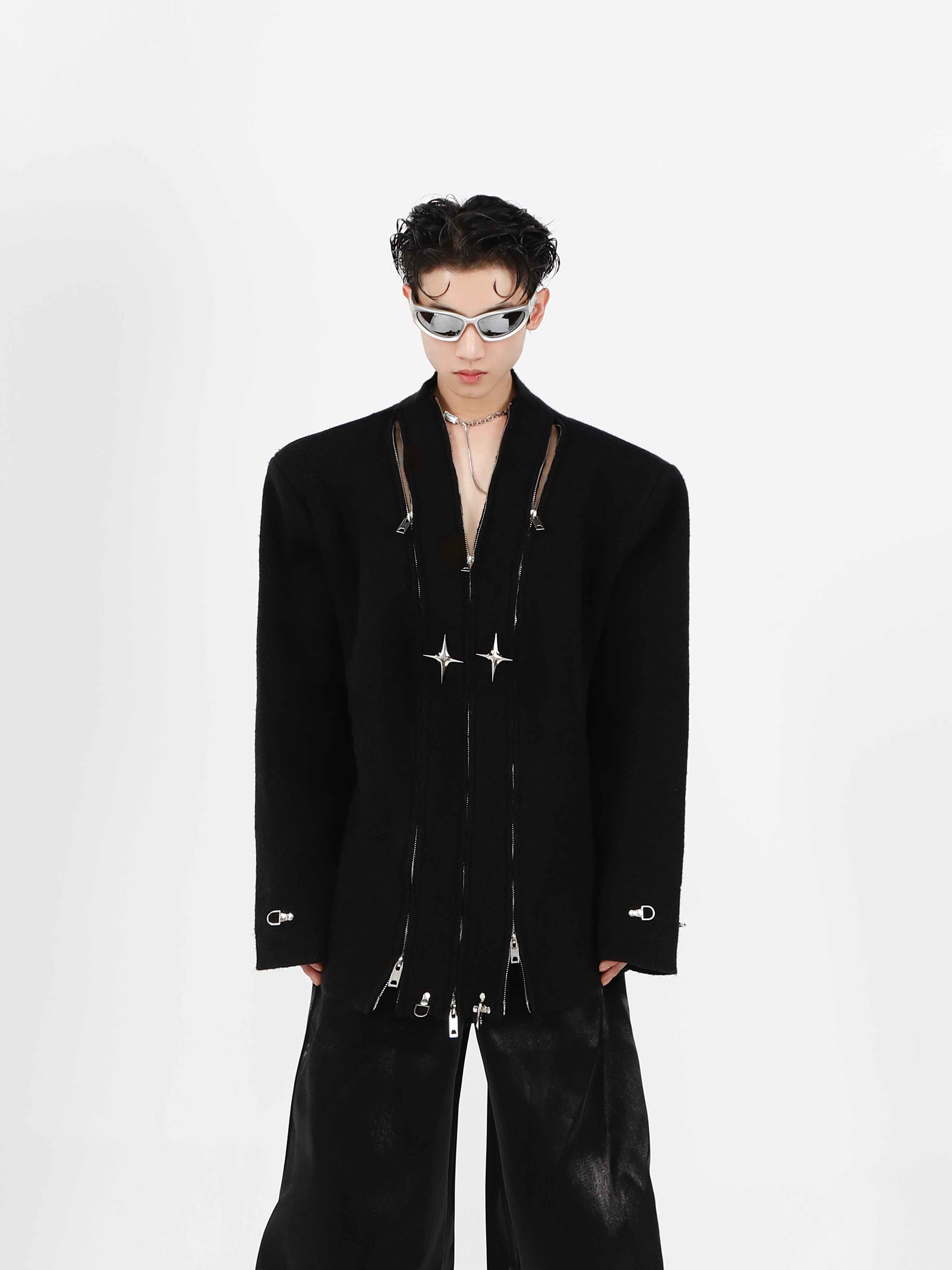 Deconstructed V-neck knit cardigan with avant-garde shoulder pads and metal accents, perfect for streetwear fashion