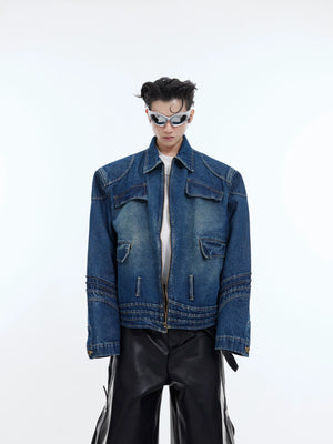 Front view of vintage denim jacket with deconstructed detailing and cropped fit, perfect for streetwear outfits