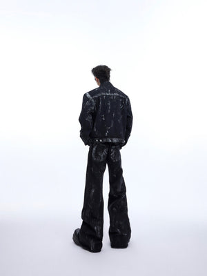 Front view of distressed denim jacket and jeans set showing raw hems and unique deconstructed design