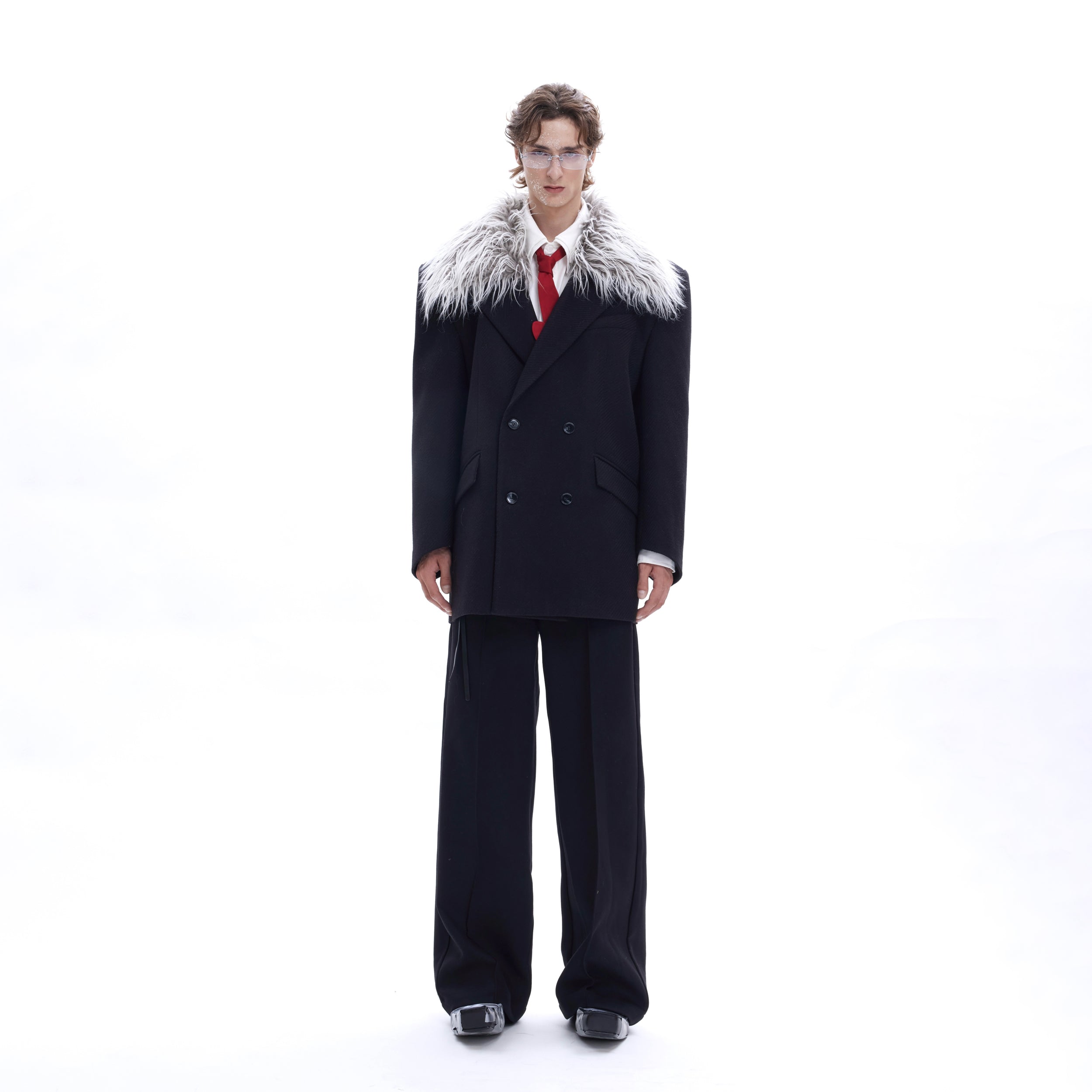 Model wearing wool-lapel blazer with removable faux fur collar for versatile styling