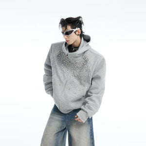 Close-up of sparkling diamond embellishments on this fashionable loose fit hooded sweatshirt