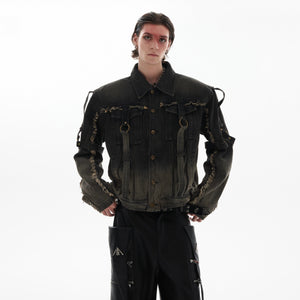 Front view of distressed denim jacket showcasing unique frayed hem details and deconstructed straps