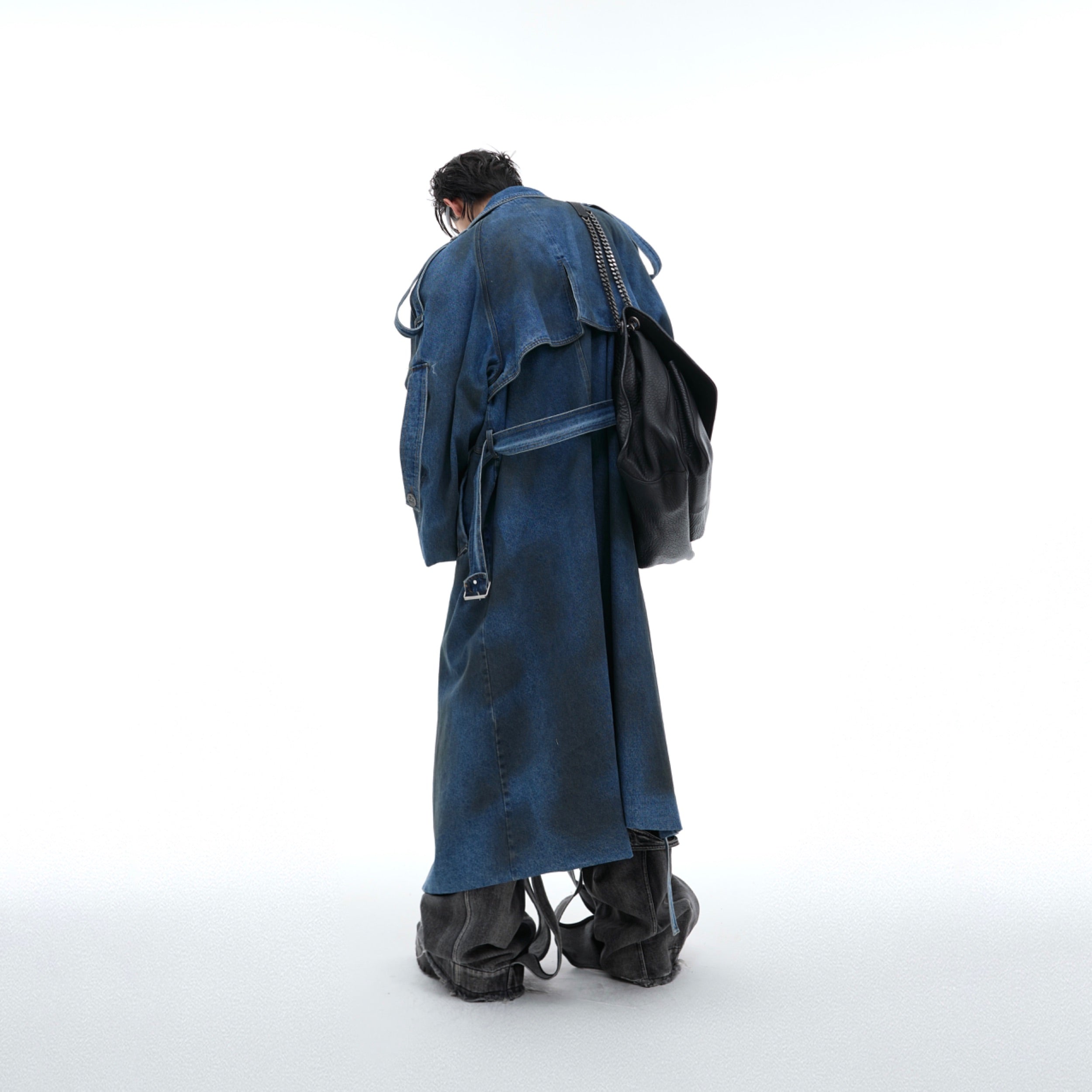 Long distressed denim jacket with raw edges and eco-friendly cotton blend fabric